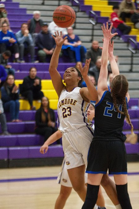 Lemoore's Jaelyn Proby keeps her eyes on the ball in a playoff win against Morro Bay Tuesday night in the LHS Event Center.